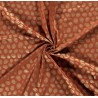 Tissu Jersey de coton calaveras dorés effet glitter sur fond corail - OekoTex